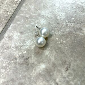 White faux pearl earrings
